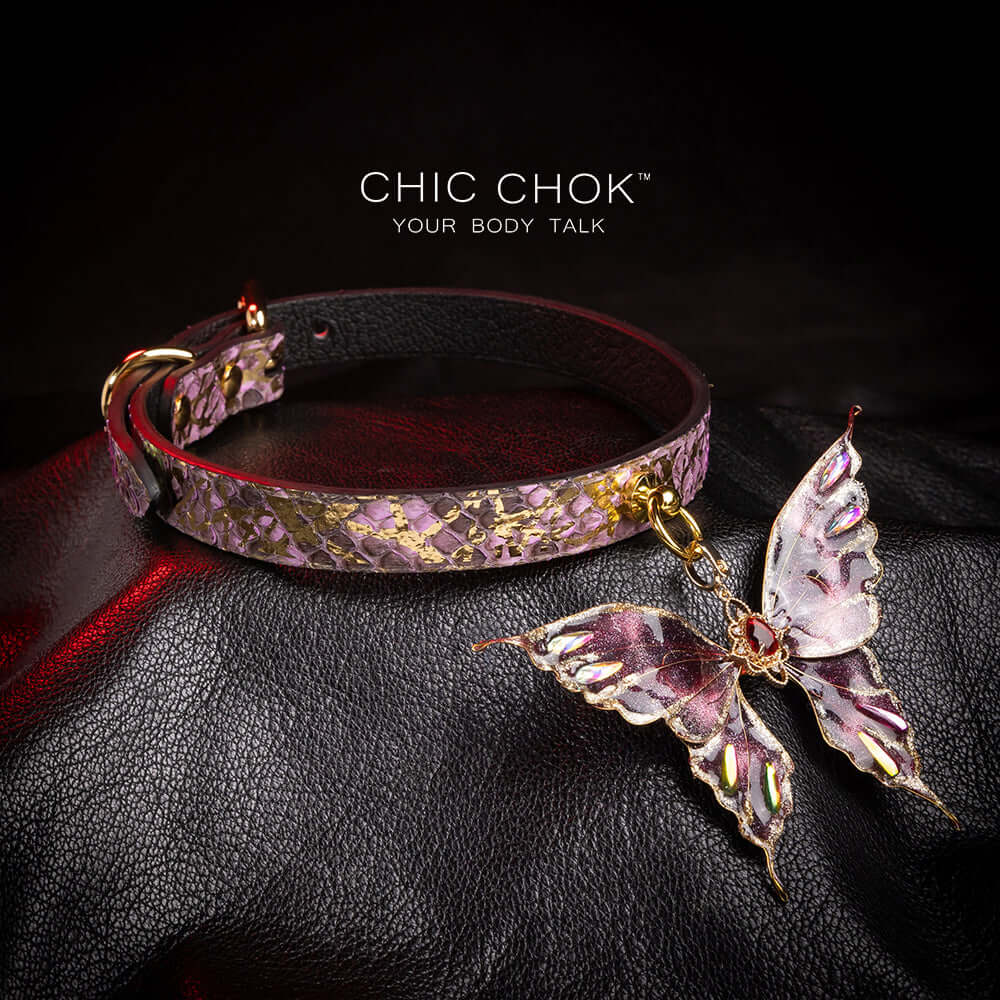 chicchok butterfly choker featuring a textured, intricate butterfly pendant adorned with gold accents and shimmering gemstones for an elegant and luxurious look.