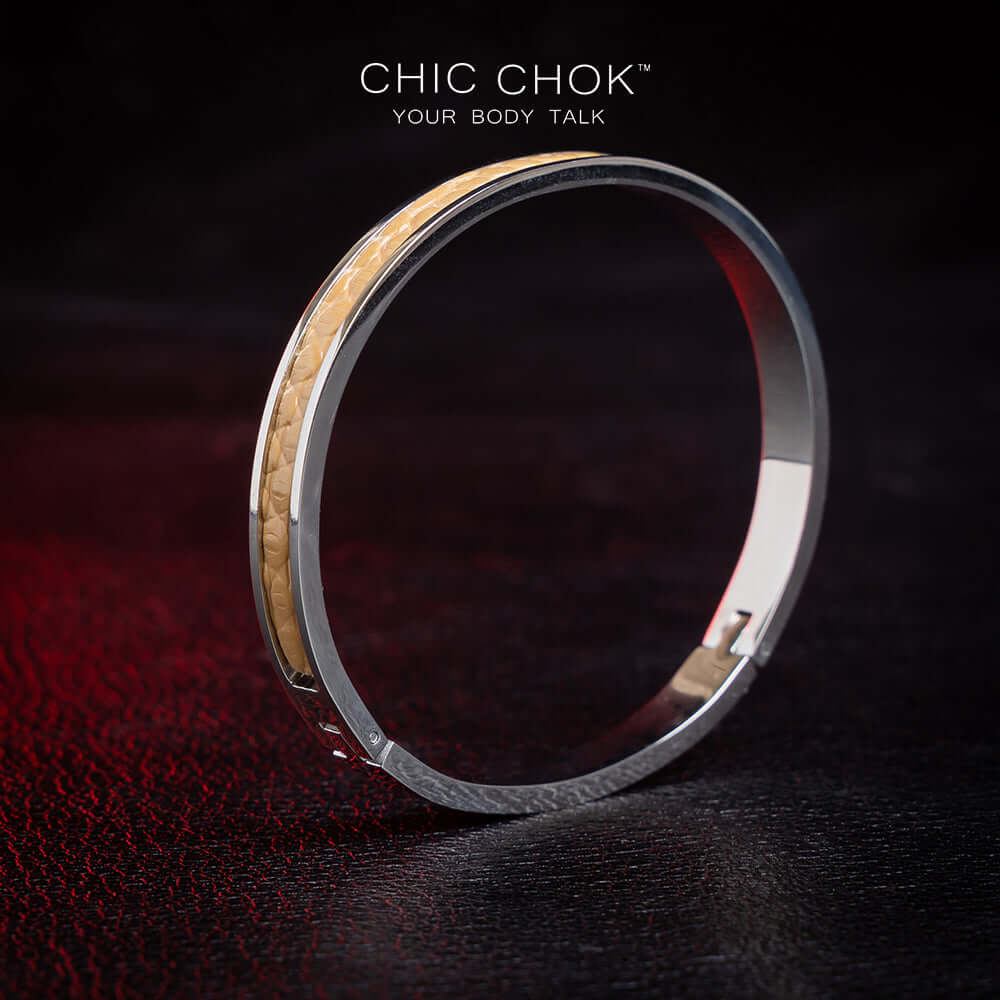 chicchok handcrafted bracelet featuring a sleek stainless steel band with a textured golden leather inlay