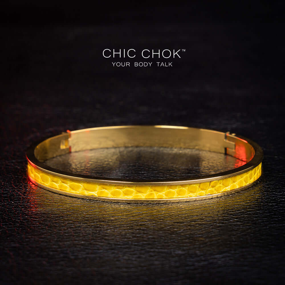 Primitive Mania - Metallic Bracelet A chicchok metal bracelet with yellow lizard skin dances like a nighttime bonfire.