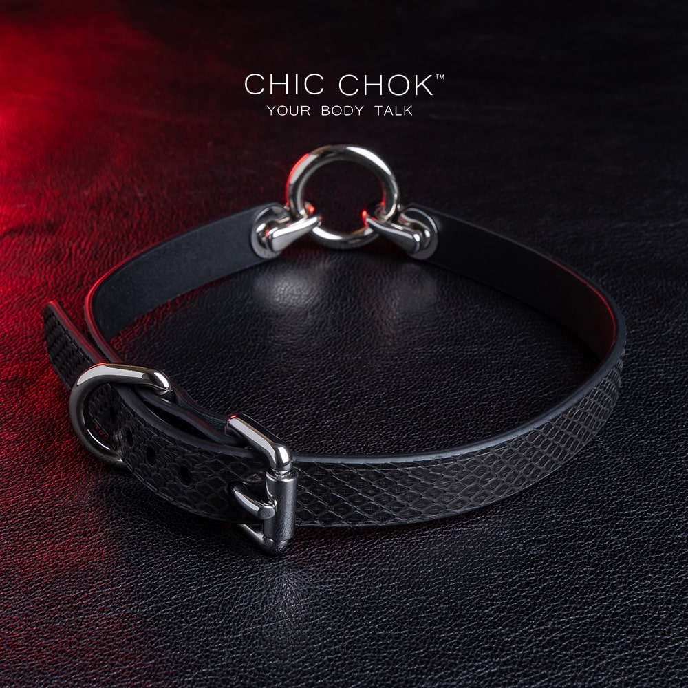 Ring design out of the circle series, predestined relationship, textured python skin given black color more detail and complexity.