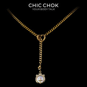 Collier cravate en Y Whispering Selene CHICCHOK | Chaîne dorée à maillons cubains en acier inoxydable avec cœur | Pendentif lune astrologique en nacre et strass décliné en 12 signes du zodiaque