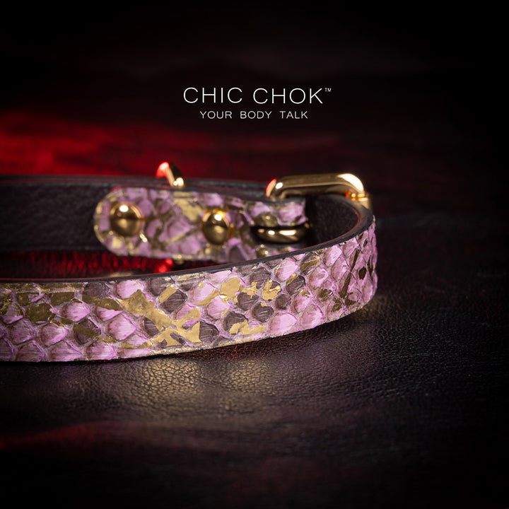 chicchok butterfly choker featuring a textured,  intricate butterfly pendant adorned with gold accents and shimmering gemstones for an elegant and luxurious look.