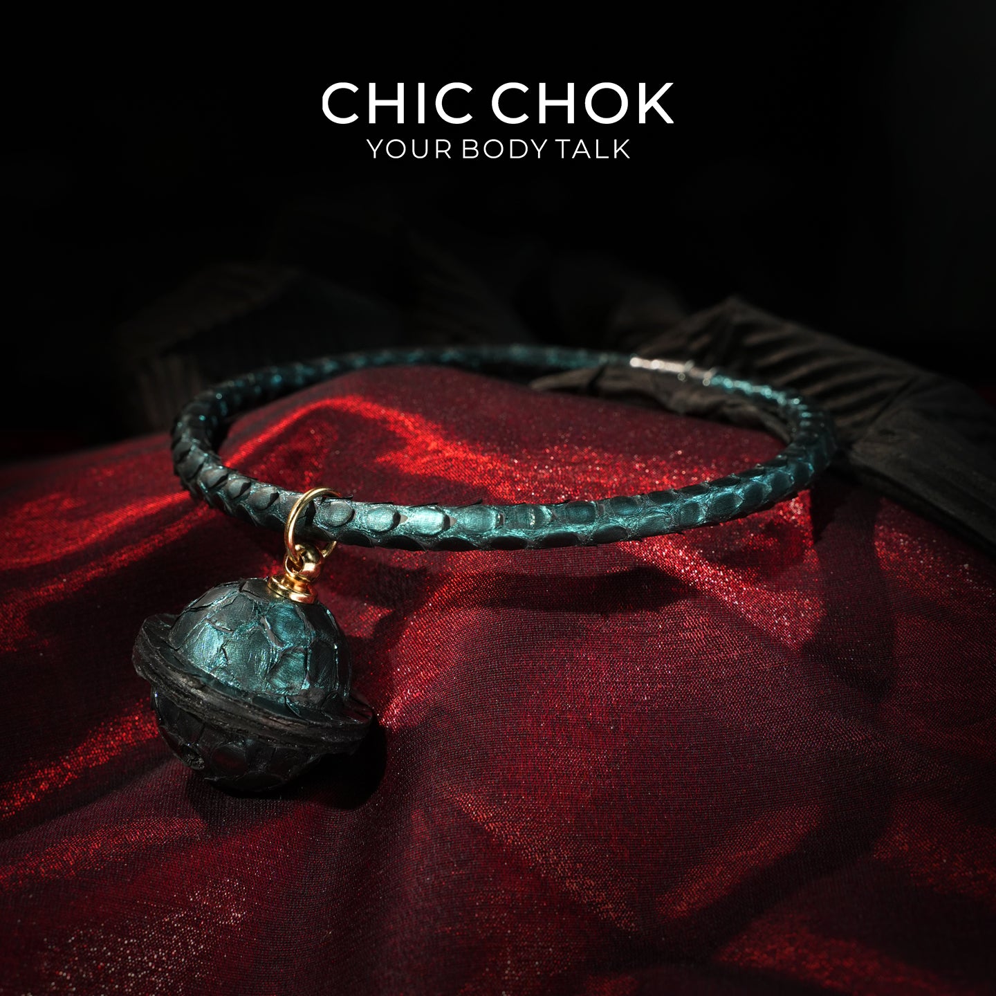 CHIC CHOK The Orchid’s Gaze Teal Snake-Texture Collar with Silent Bell Pendant