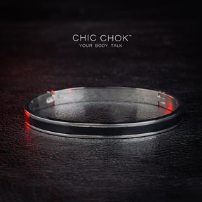 chicchok stainless steel bracelet with a sleek, minimalist design. This elegant and subtle accessory is perfect for adding a touch of modern style to any outfit.