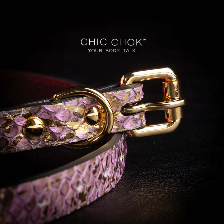 chicchok butterfly choker featuring a textured,  intricate butterfly pendant adorned with gold accents and shimmering gemstones for an elegant and luxurious look.