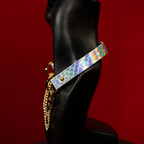 chicchok breathless choker featuring a white textured design with iridescent scales that reflect vibrant rainbow colors