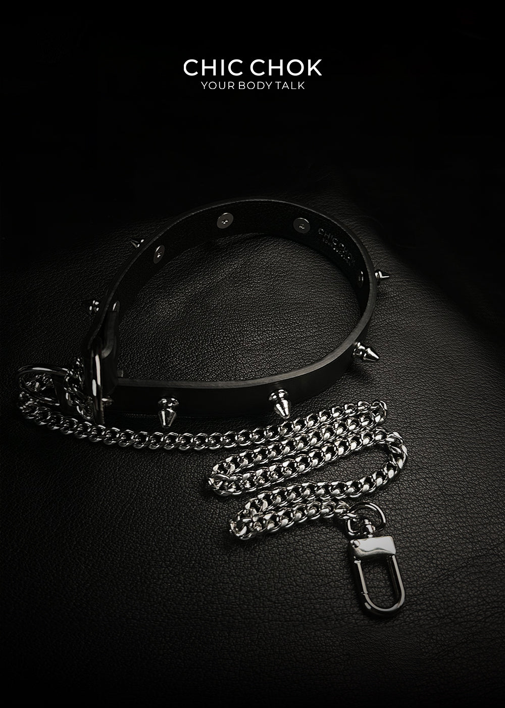 Adjustable spiked choker with intense silver spikes, perfect for alternative fashion.
