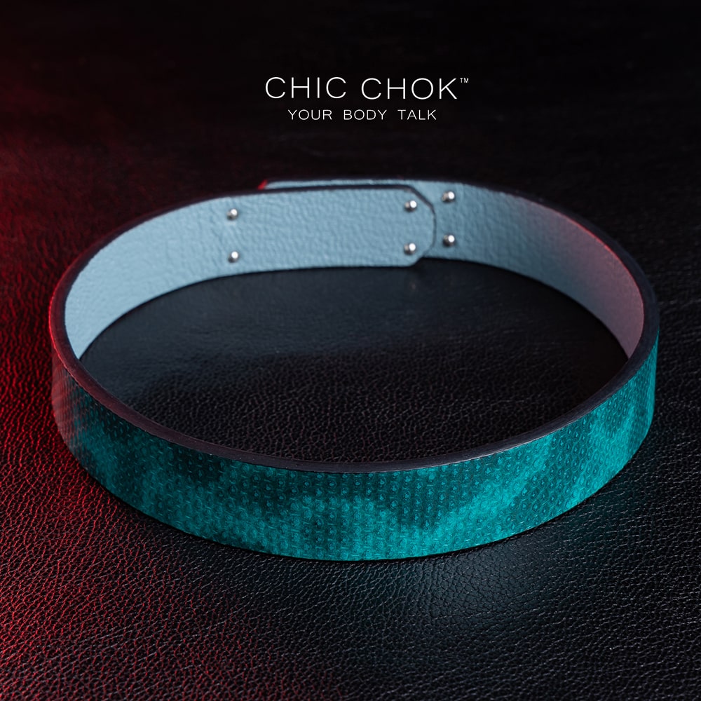 chicchok PoisonIvy Collar CHICCHOK green textured leather choker with a metallic silver locking clasp and light blue inner lining, showcasing luxurious craftsmanship and modern edgy design for bold fashion statements