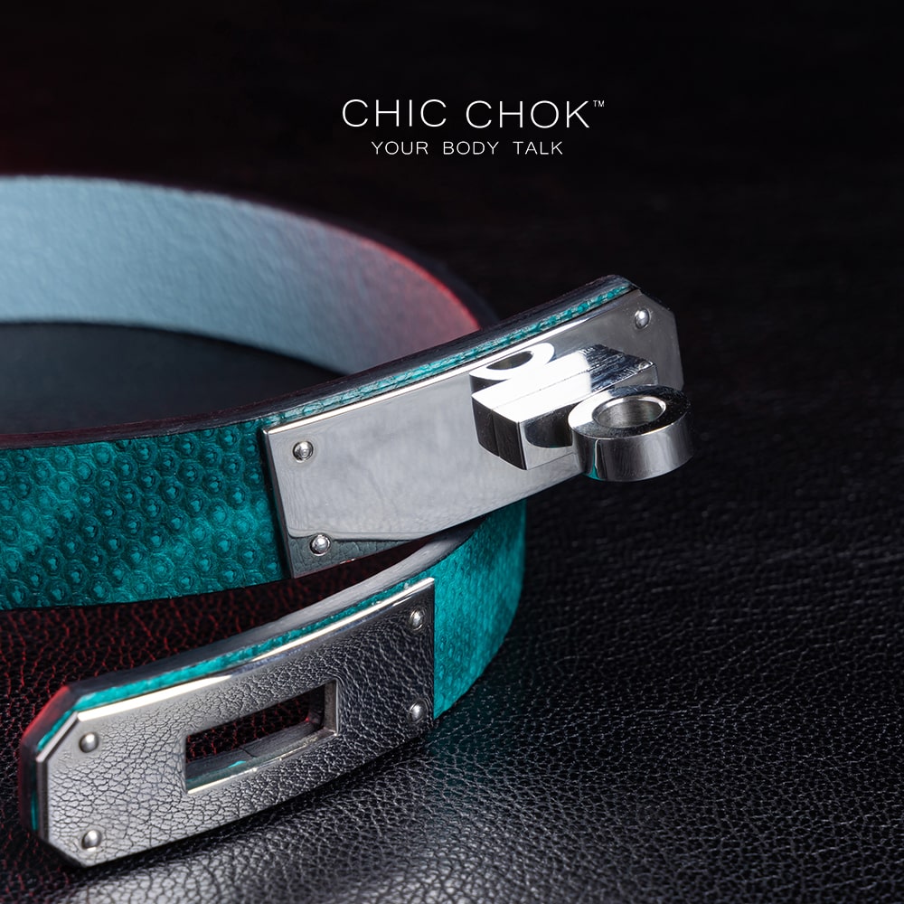 chicchok PoisonIvy Collar CHICCHOK green textured leather choker with a metallic silver locking clasp and light blue inner lining, showcasing luxurious craftsmanship and modern edgy design for bold fashion statements