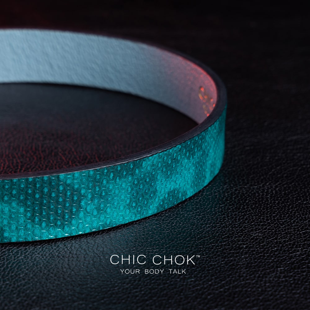 chicchok PoisonIvy Collar CHICCHOK green textured leather choker with a metallic silver locking clasp and light blue inner lining, showcasing luxurious craftsmanship and modern edgy design for bold fashion statements