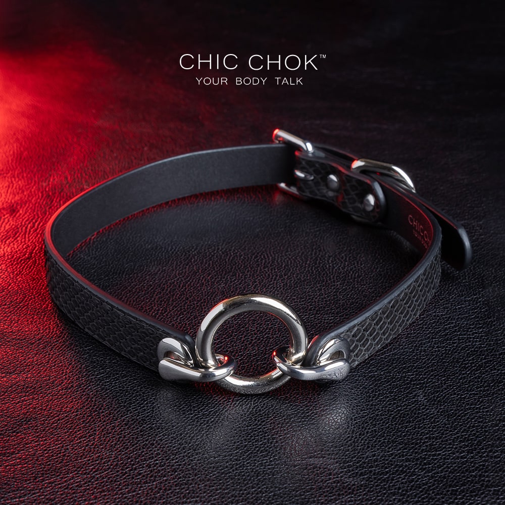 Ring design out of the circle series, predestined relationship, textured python skin given black color more detail and complexity.