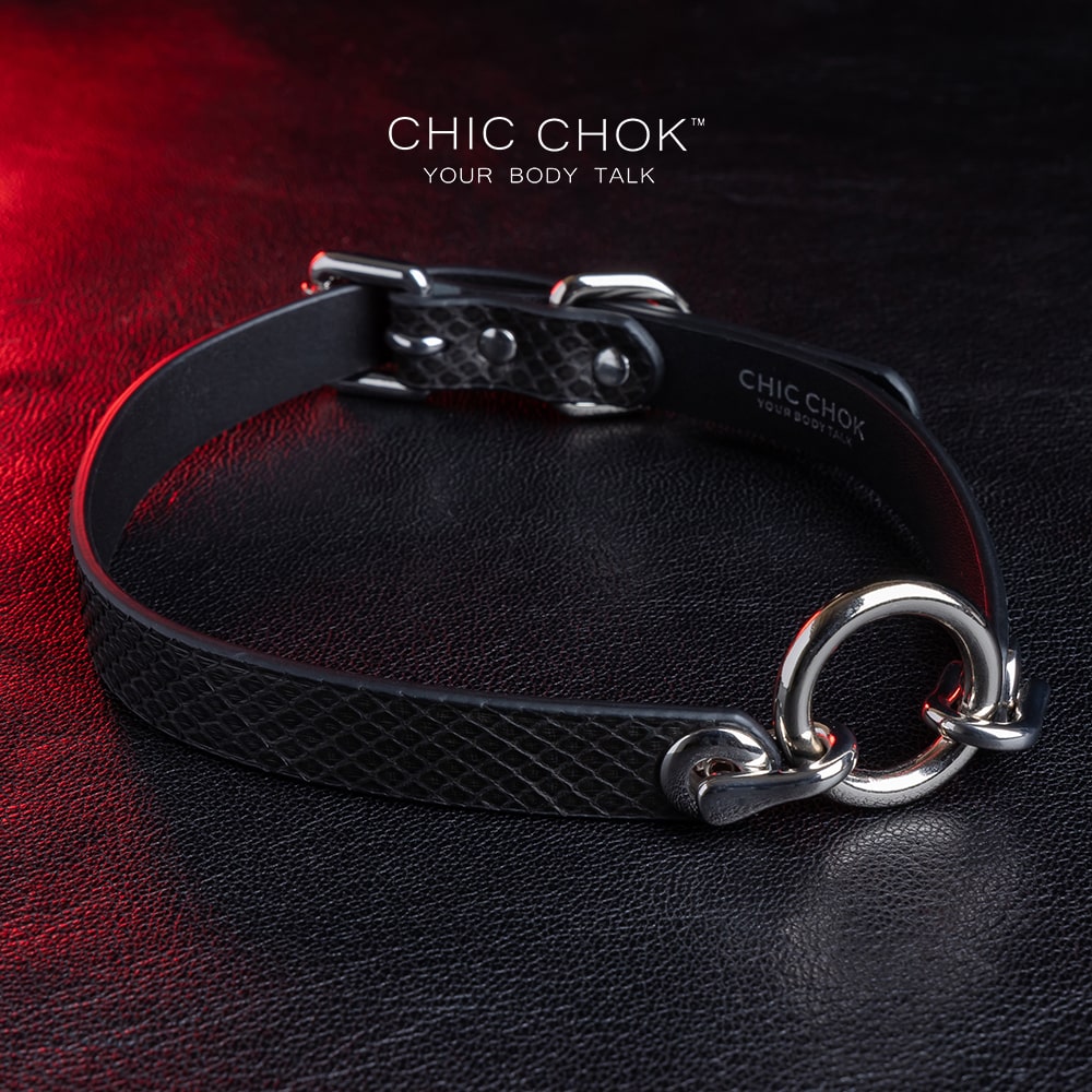 Ring design out of the circle series, predestined relationship, textured python skin given black color more detail and complexity.