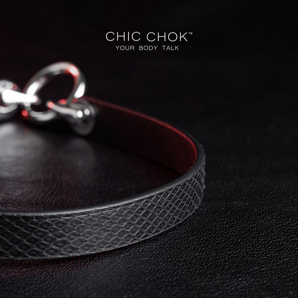 Ring design out of the circle series, predestined relationship, textured python skin given black color more detail and complexity.