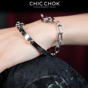 CHICCHOK Shackle Bond Wrist to Finger Chain Bracelet | Gothic Stainless Steel Studded Handcuff Cuff | Subversive Y2K Industrial Punk Crossed Ring Harness Jewelry