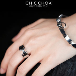 CHICCHOK Shackle Bond Wrist to Finger Chain Bracelet | Gothic Stainless Steel Studded Handcuff Cuff | Subversive Y2K Industrial Punk Crossed Ring Harness Jewelry