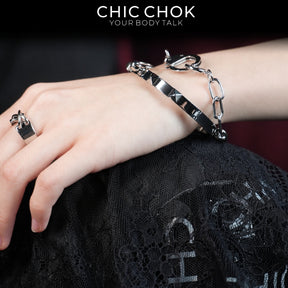 CHICCHOK Shackle Bond Wrist to Finger Chain Bracelet | Gothic Stainless Steel Studded Handcuff Cuff | Subversive Y2K Industrial Punk Crossed Ring Harness Jewelry